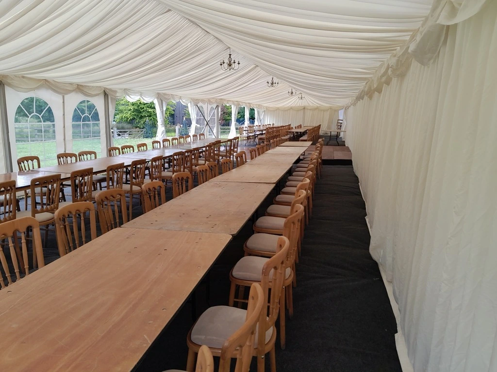 Elegant marquee with dining setup